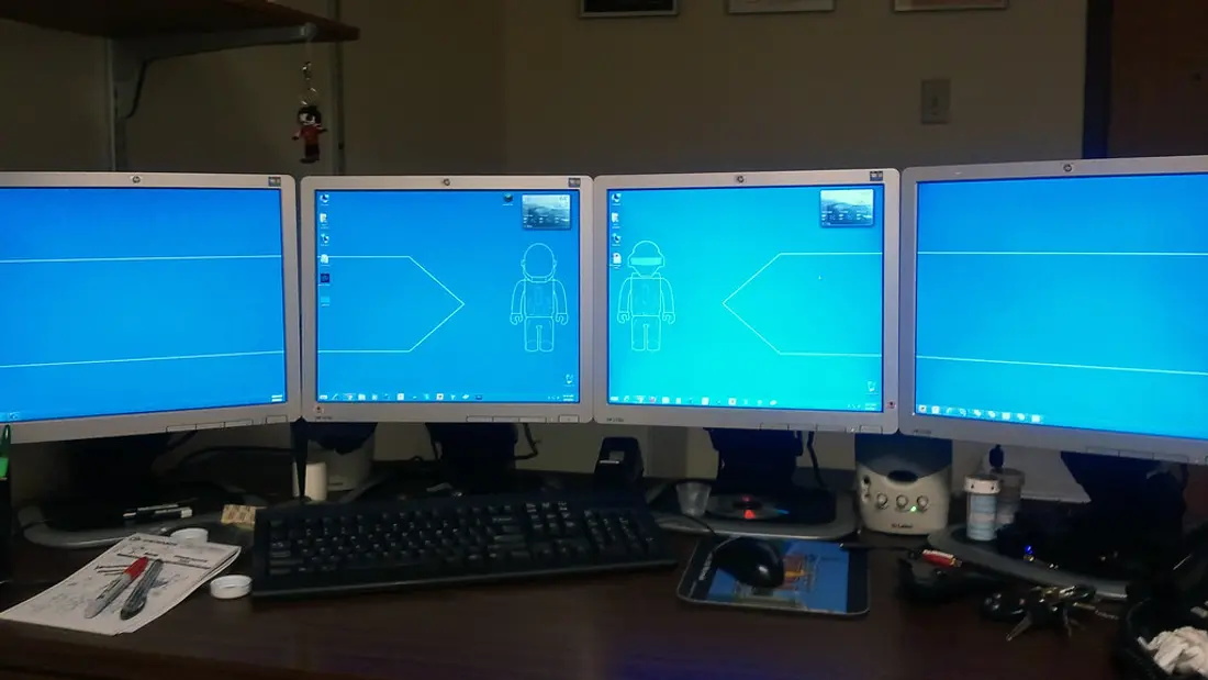 A tutor working through admin tasks at a desk