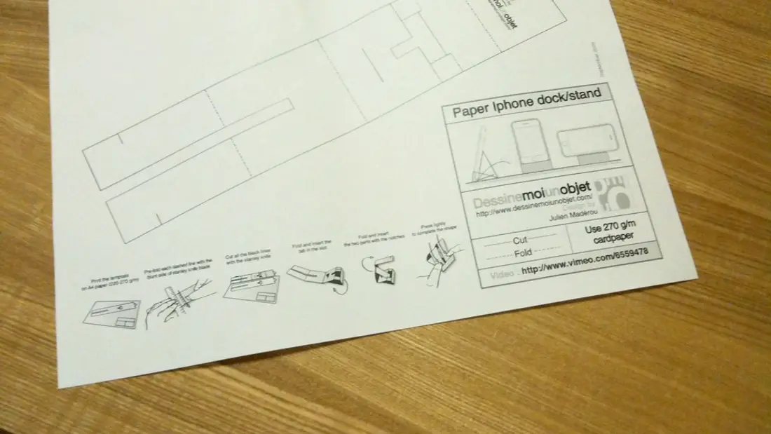 A tutor sketching out a business plan in a notebook