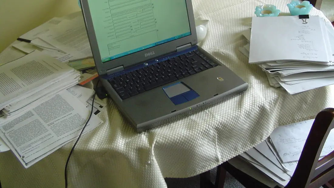 A student joining an online lesson from a laptop at home